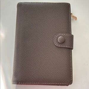 Brown pebble faux leather travel wallet